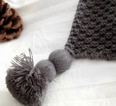 Nordic fringed knit blanket