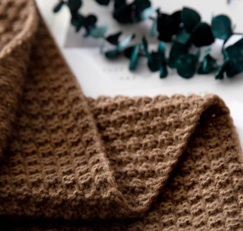 Nordic fringed knit blanket